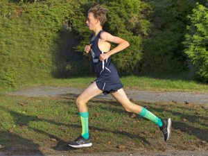Varsity Cross Country runner